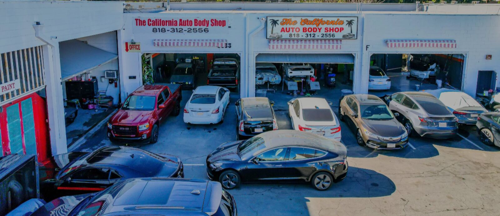 The California Auto Body Shop storefront on Reseda Blvd